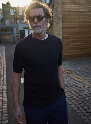 sustainable menswear navy ZQ merino traceable wool tshirt accompanied with white tshirt 