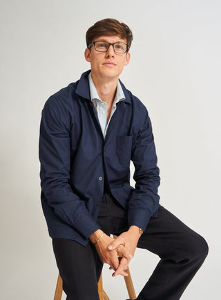 100% Regenerative Cotton Navy Shirt Jacket. Three pocket and button down.