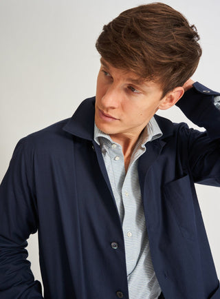 100% Regenerative Cotton Navy Shirt Jacket. Three pocket and button down.