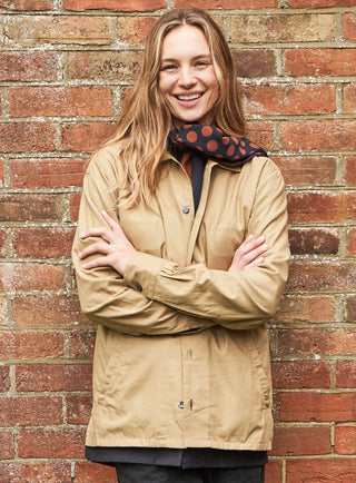 100% Recycled Double Faced Wool Burnt Orange Navy Spot Classic Scarf on one side, thick stripe on the other side.