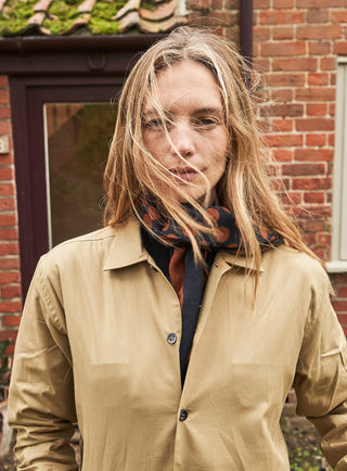 100% Recycled Double Faced Wool Burnt Orange Navy Spot Classic Scarf on one side, thick stripe on the other side.