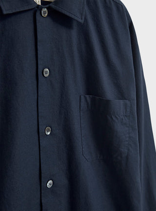 100% Regenerative Cotton Navy Shirt Jacket. Three pocket and button down.